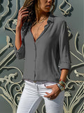 Losse damesblouse met knoopsluiting