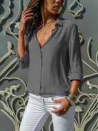 Losse damesblouse met knoopsluiting