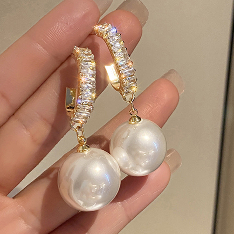 Luxueuze oorbellen met parels en zirkonia