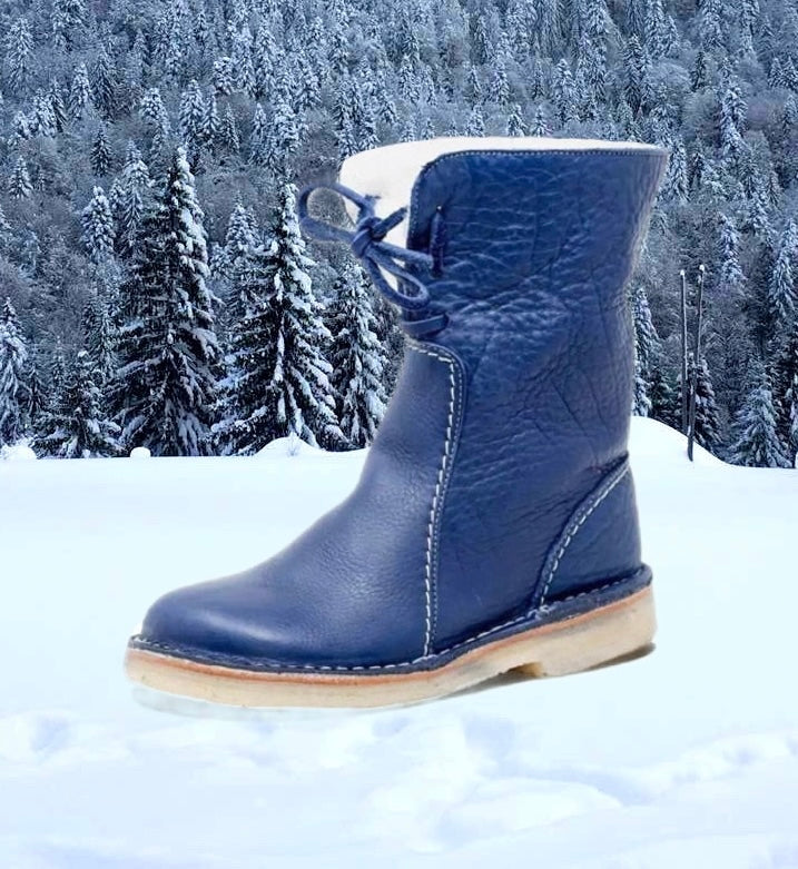 Damesboots van nubuckleer met wollen voering en vetersluiting