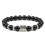Bedelarmband met natuurstenen en uil