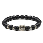 Bedelarmband met natuurstenen en uil
