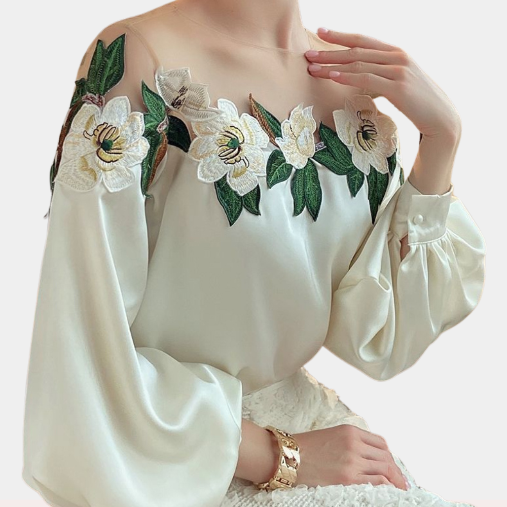 Gebloemde beige damesblouse met losse pasvorm