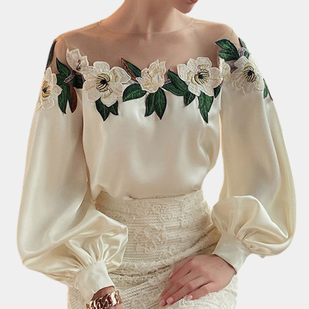 Gebloemde beige damesblouse met losse pasvorm