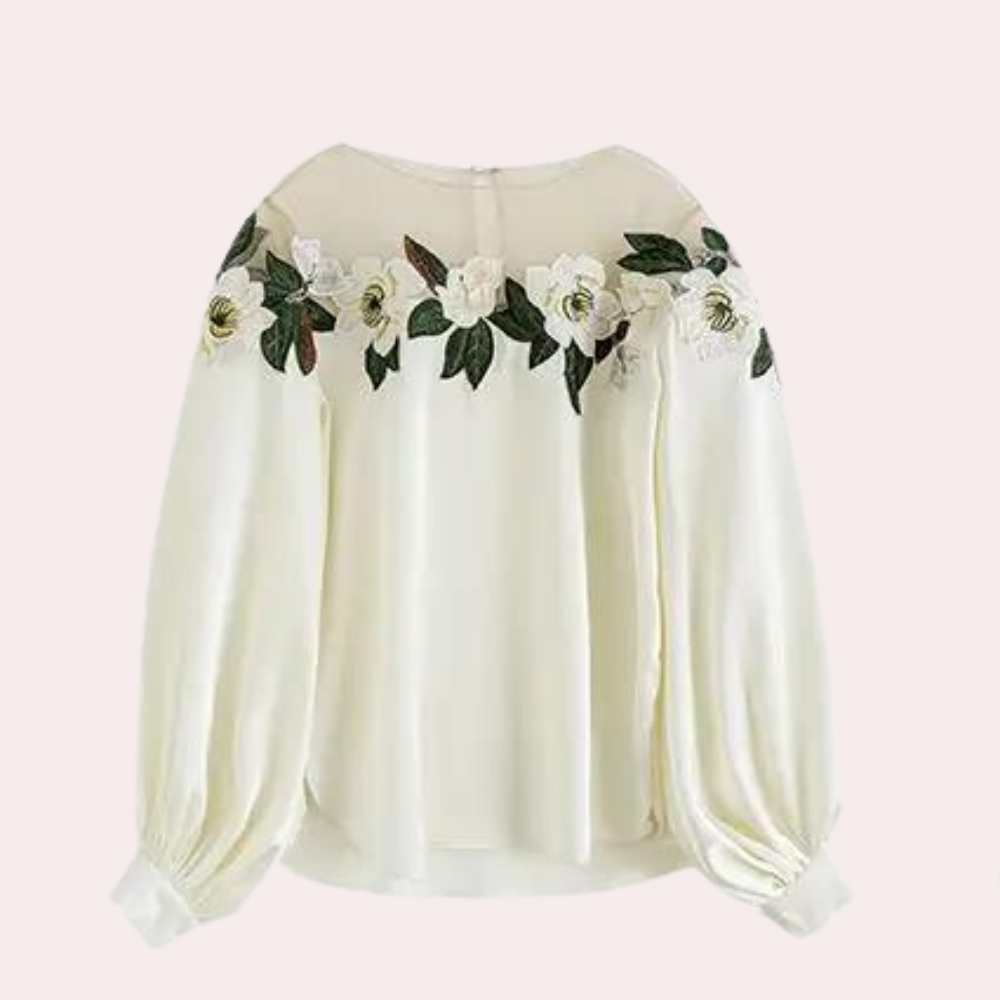 Gebloemde beige damesblouse met losse pasvorm