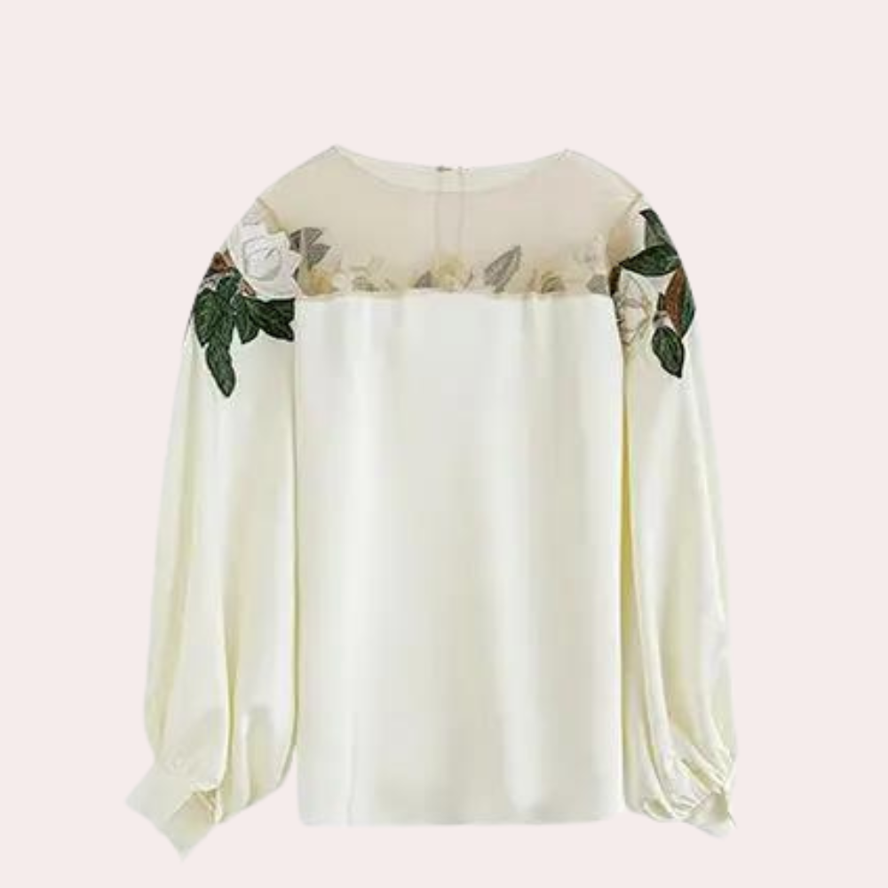 Gebloemde beige damesblouse met losse pasvorm