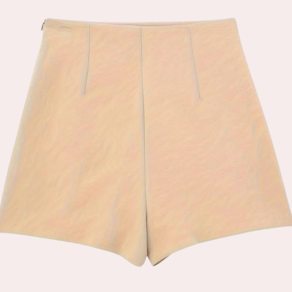 Asymmetrische damesshort met sierknopen