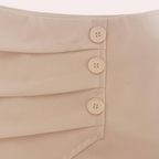 Asymmetrische damesshort met sierknopen