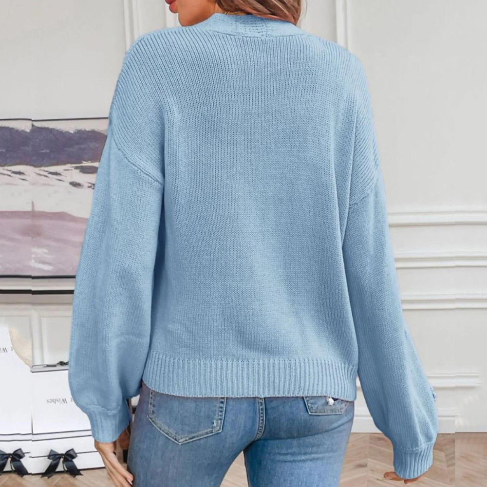 Gebreid damesvest met 3D bloemen