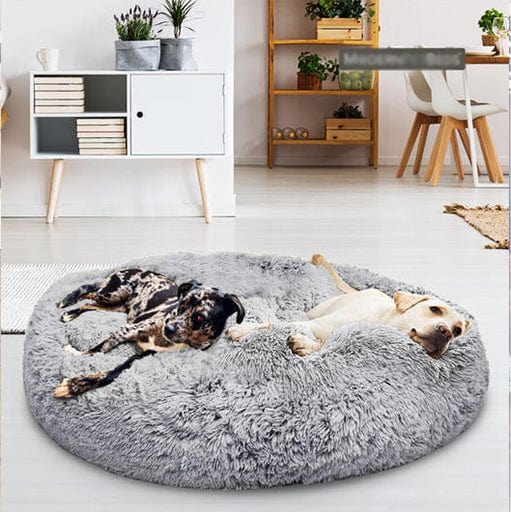 Rond pluche huisdierenbed met verhoogde rand