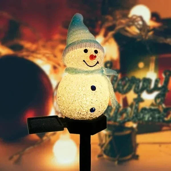 Zonne-energie sneeuwpop lamp