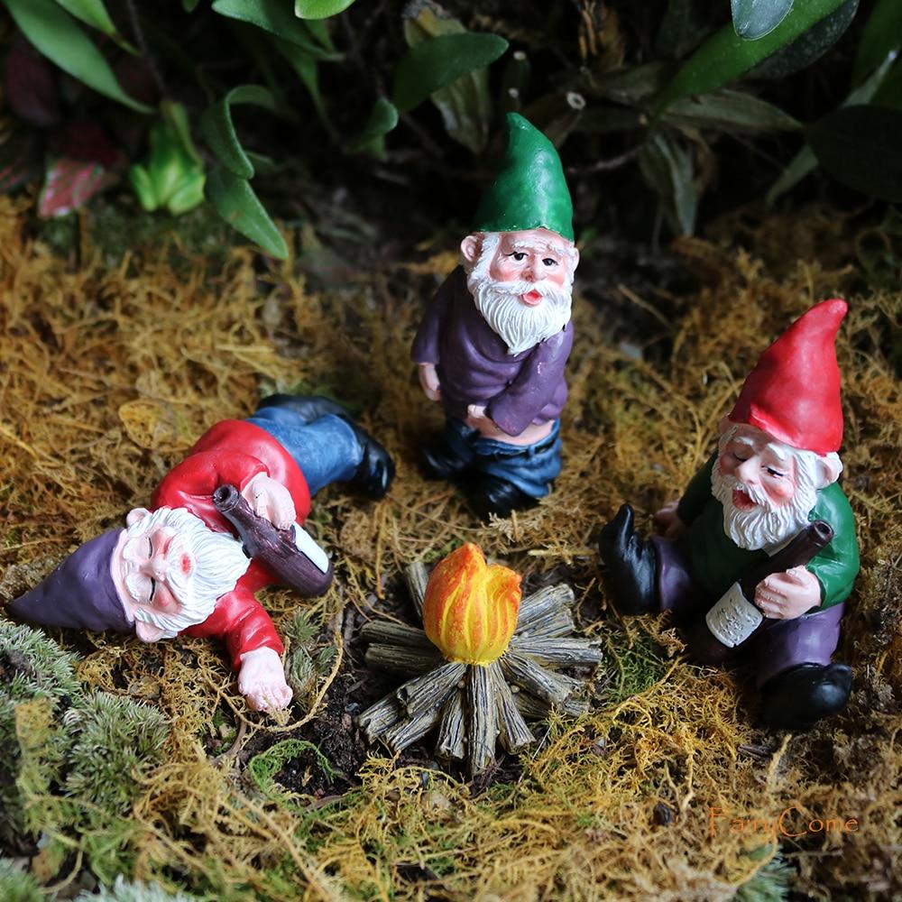 Dronken kabouters – creatieve tuindecoratie