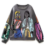 Losvallende wolprint sweater