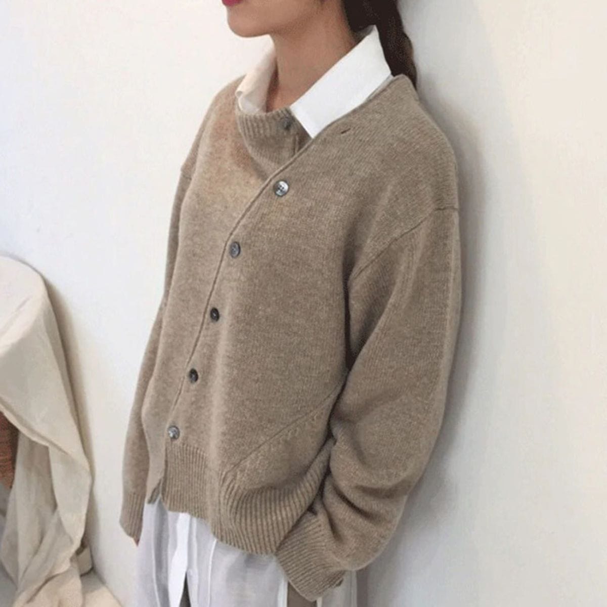 Wikkelcardigan met knoopdetail