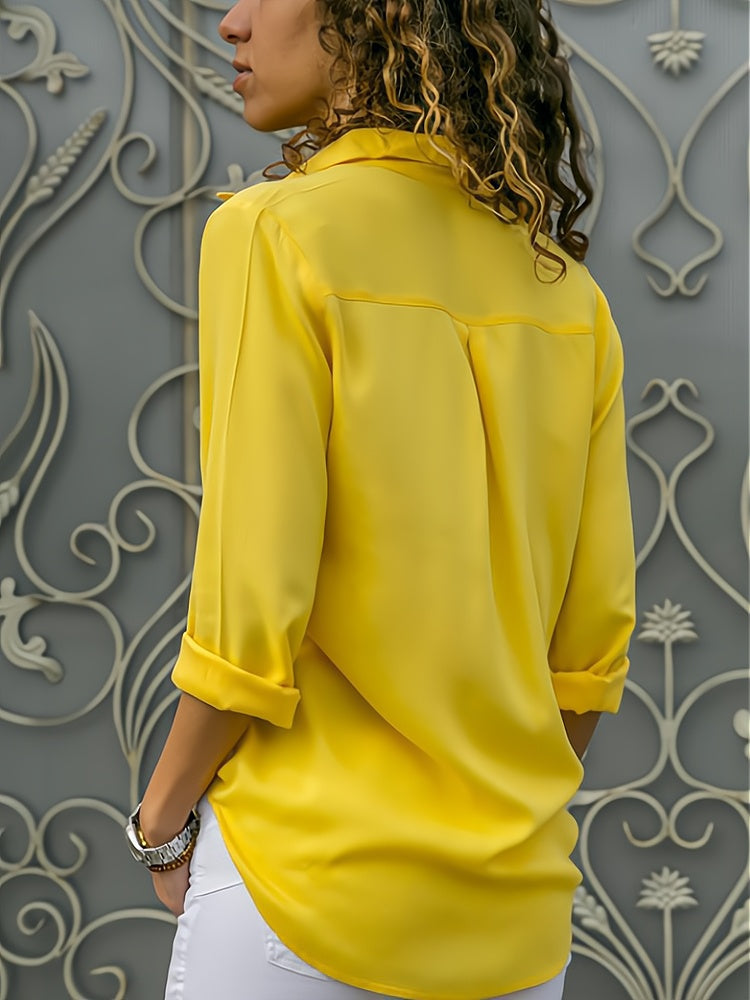 Losse damesblouse met knoopsluiting