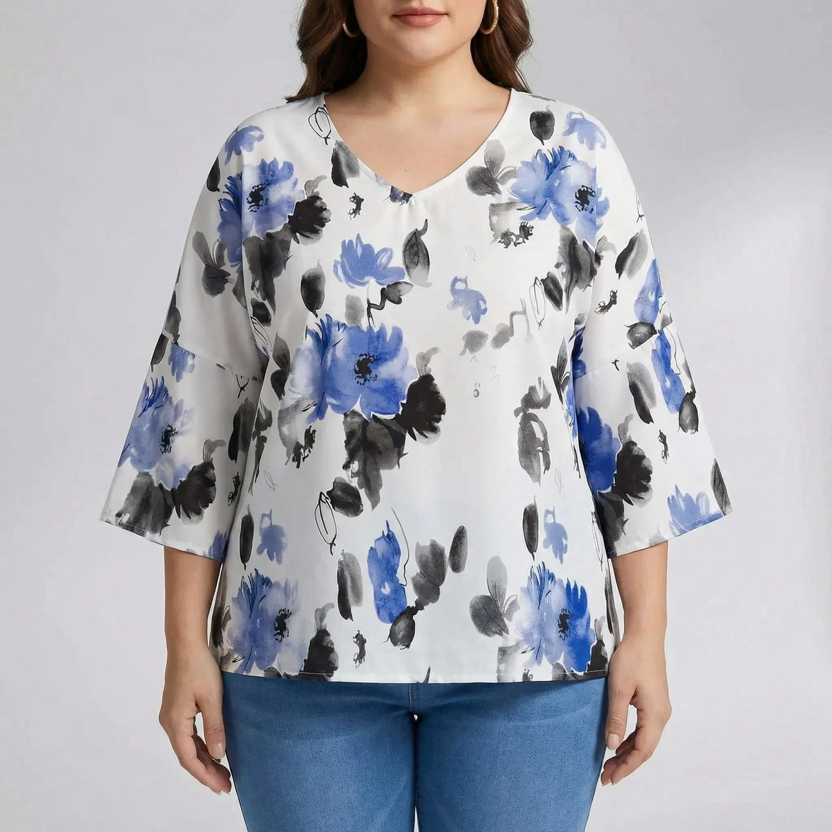 Bloemenprint v-halsblouse in plusmaat — afbeelding 18