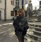 Dames winterponcho