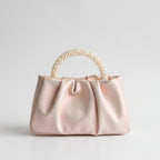 Geplooide clutch avondtas