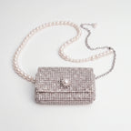 Glinsterende mini-tas met details
