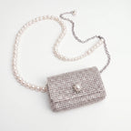 Glinsterende mini-tas met details