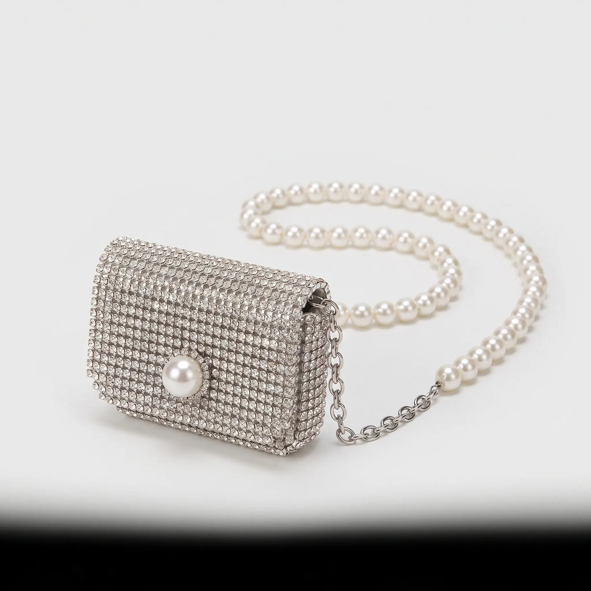 Glinsterende mini-tas met details