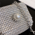 Glinsterende mini-tas met details