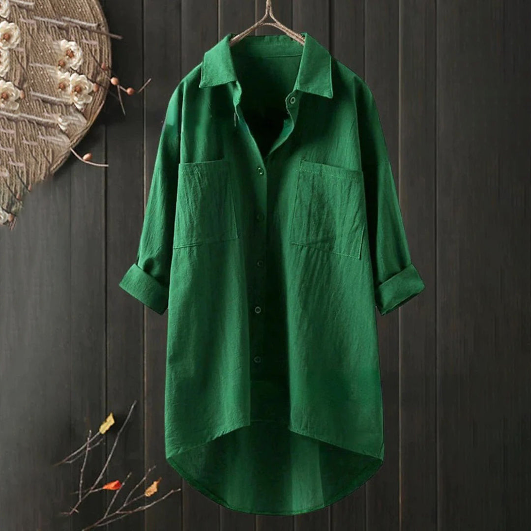 Luchtige damesblouse met lange mouwen en voorzakken