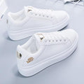 Dames sneakers van kunstleer met metallic accenten