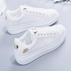 Dames sneakers van kunstleer met metallic accenten