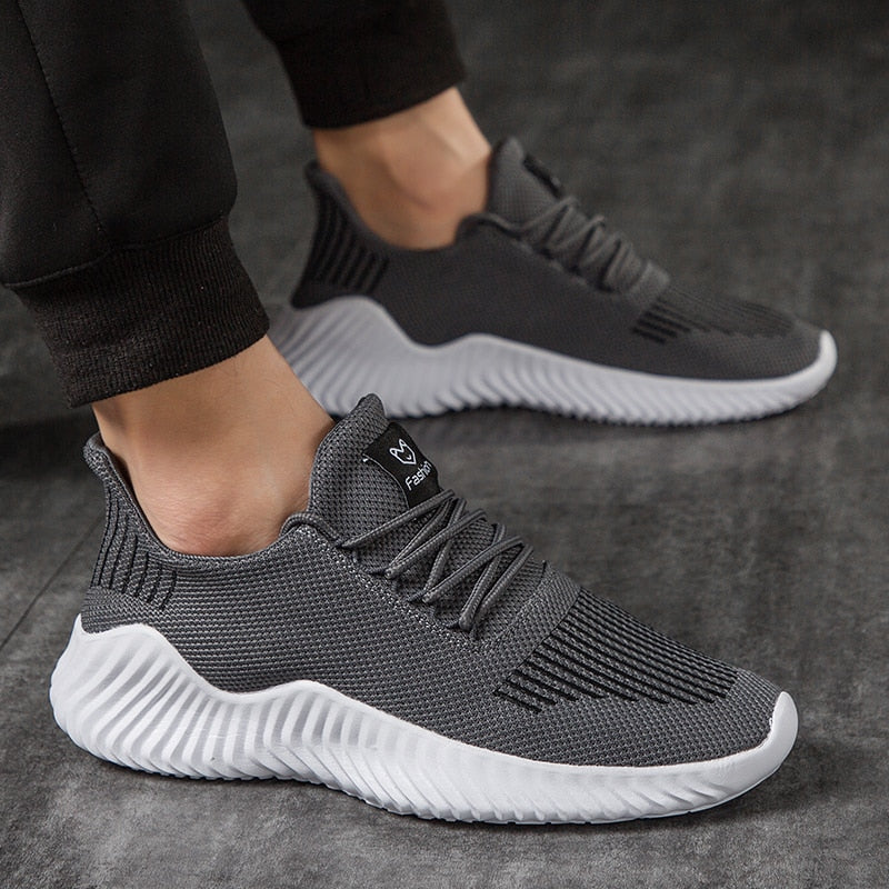 Ademende heren hardloopschoenen met mesh schacht