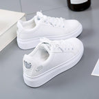 Dames sneakers van kunstleer met metallic accenten