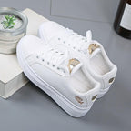 Dames sneakers van kunstleer met metallic accenten