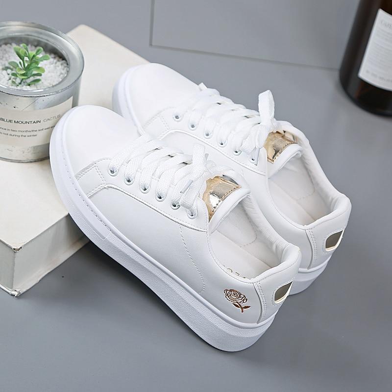 Dames sneakers van kunstleer met metallic accenten