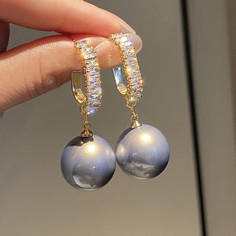 Luxueuze oorbellen met parels en zirkonia
