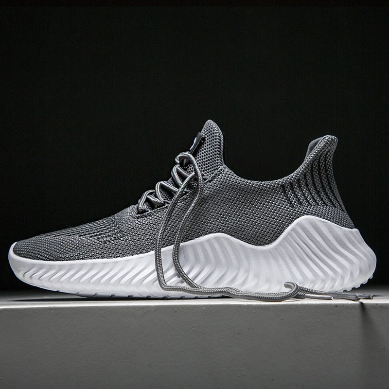Ademende heren hardloopschoenen met mesh schacht