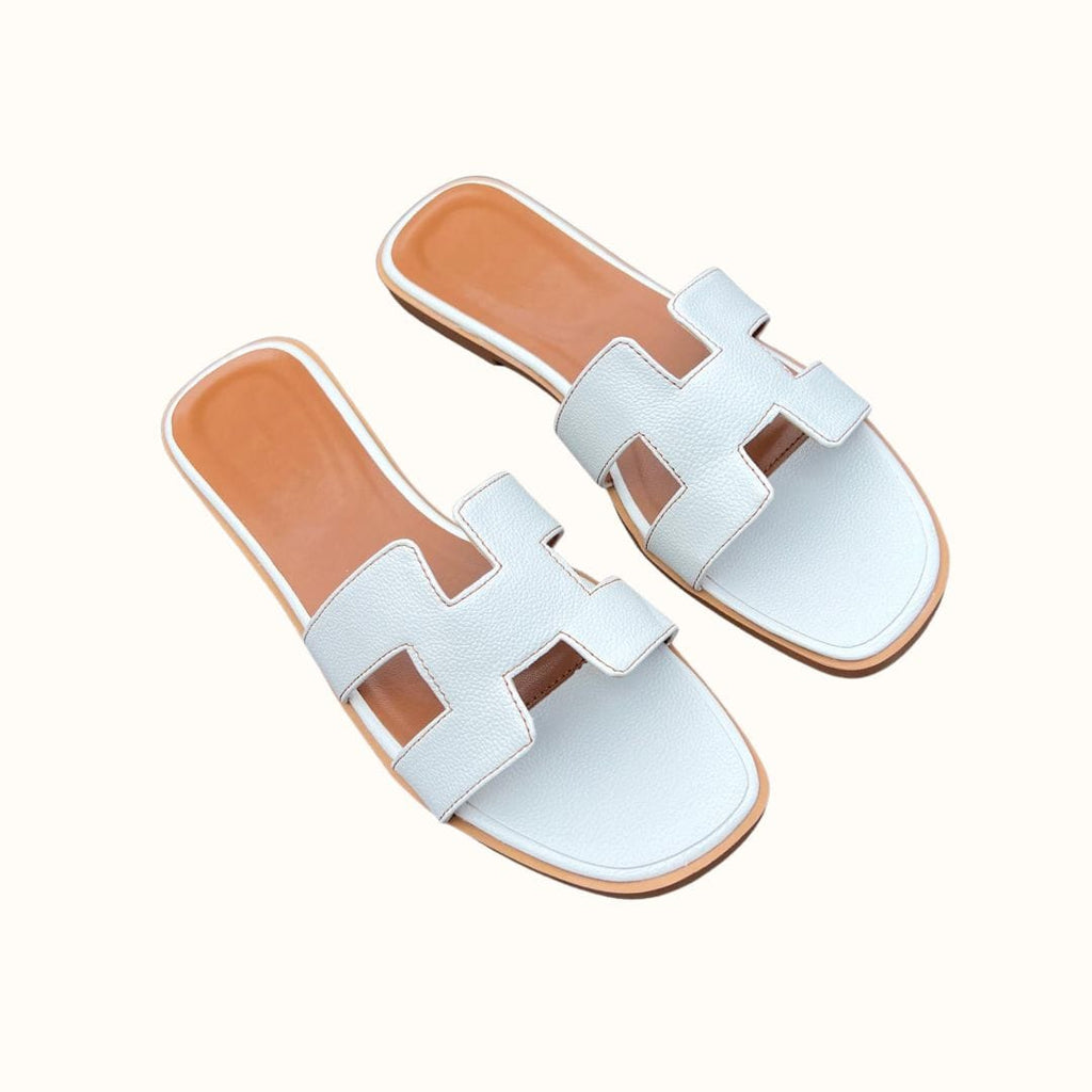 En modieuze slippers