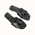 En modieuze slippers
