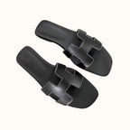 En modieuze slippers