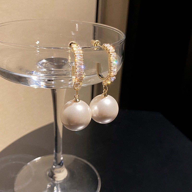 Luxueuze oorbellen met parels en zirkonia