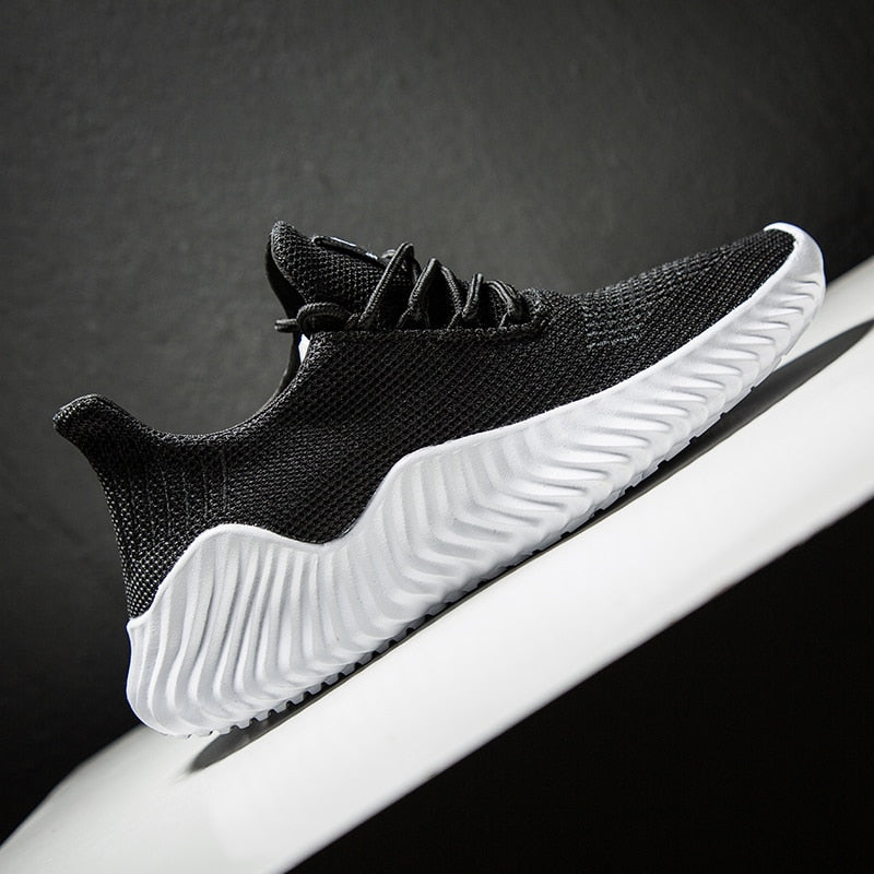 Ademende heren hardloopschoenen met mesh schacht