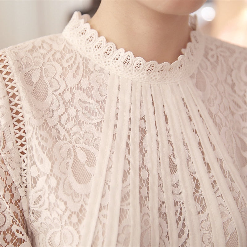 Kanten damesblouse met lange mouwen