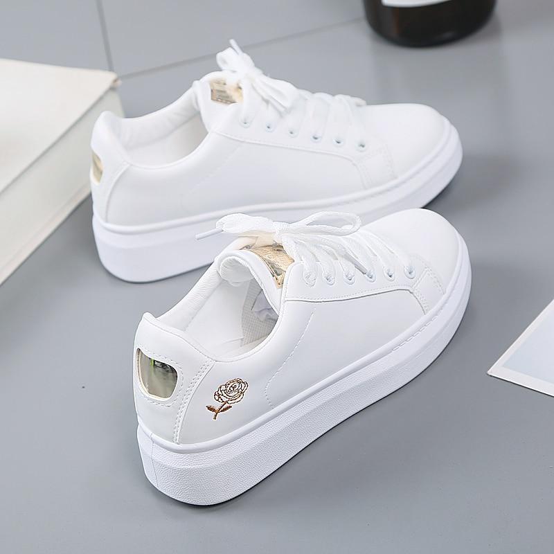 Dames sneakers van kunstleer met metallic accenten