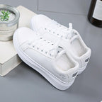 Dames sneakers van kunstleer met metallic accenten
