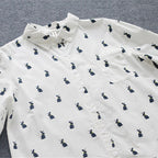 Speelse shirtjurk met konijnenprint en reverskraag
