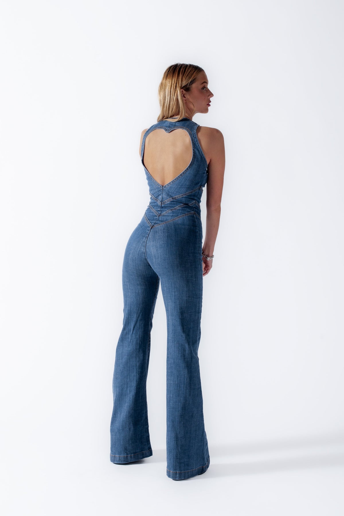 Hartvormige rugloze dames denim jumpsuit