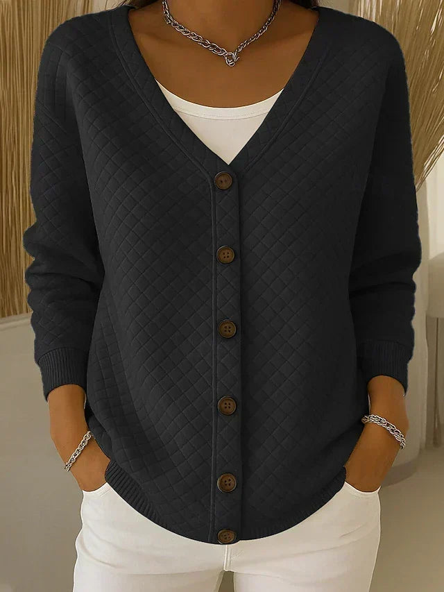 Gewatteerd vest met V-hals en knoopsluiting