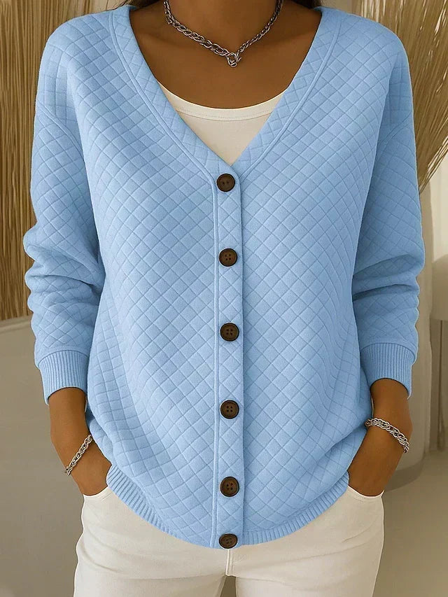 Gewatteerd vest met V-hals en knoopsluiting