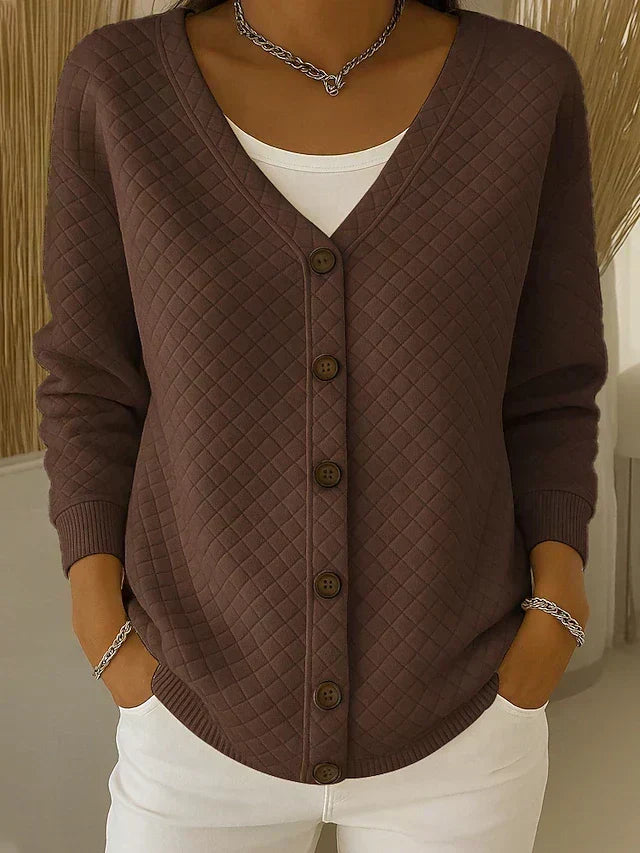 Gewatteerd vest met V-hals en knoopsluiting