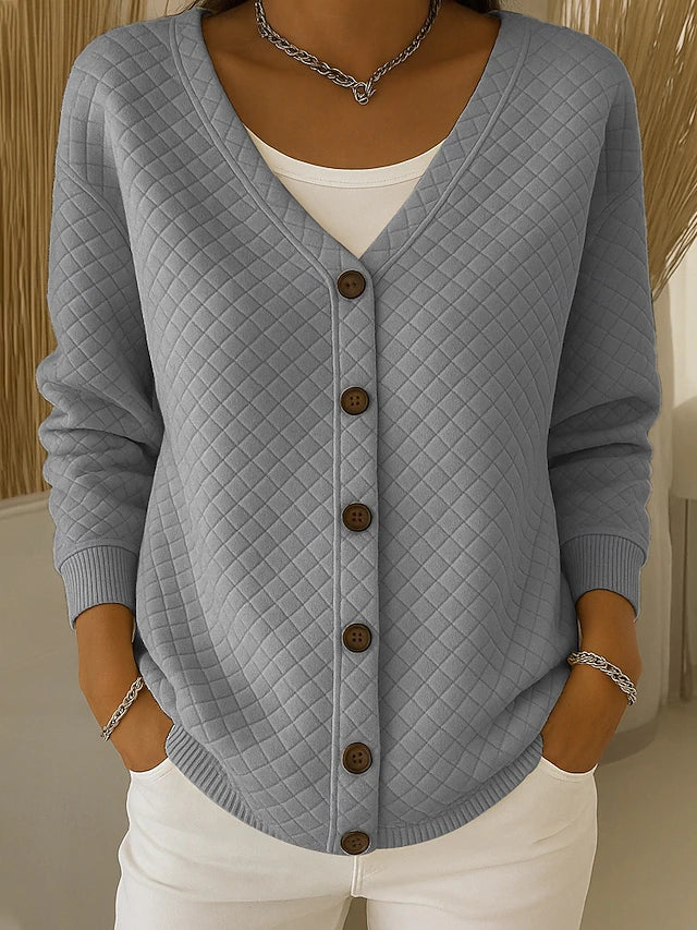 Gewatteerd vest met V-hals en knoopsluiting