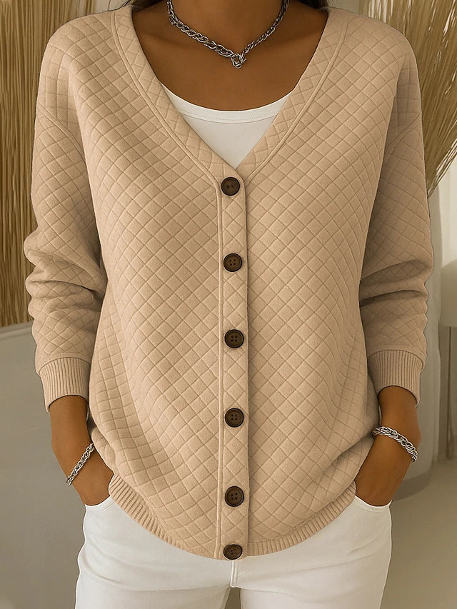 Gewatteerd vest met V-hals en knoopsluiting